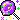 pixel art of purple lollipop surrounded by colorful glitter.