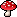 pixel art of a red mushroom.
