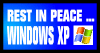 blue stamp with text that reads 'rest in peace ... windows XP'.
